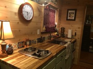 Kitchen with butcher block and cedar wall