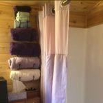 Shower stall and towel rack